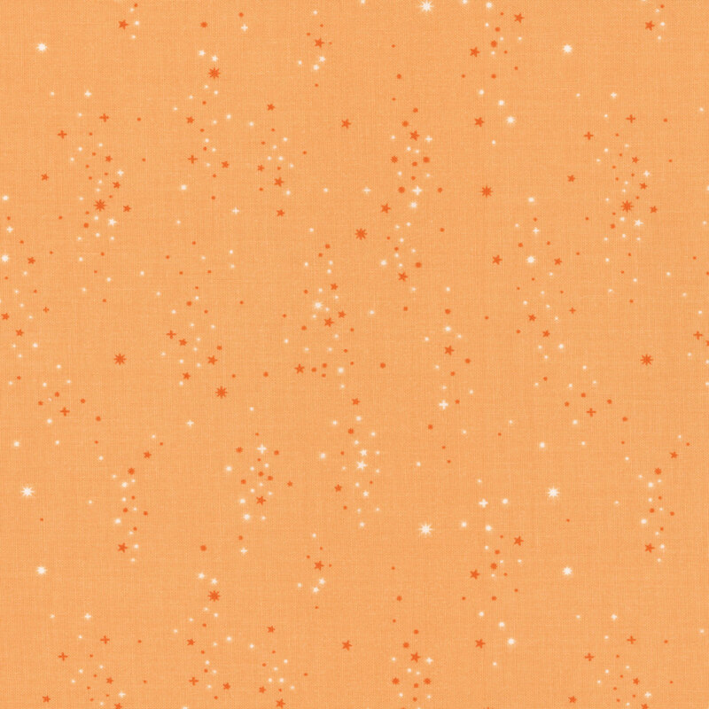 Orange fabric features a scattered pattern of small dark orange and white star clusters.