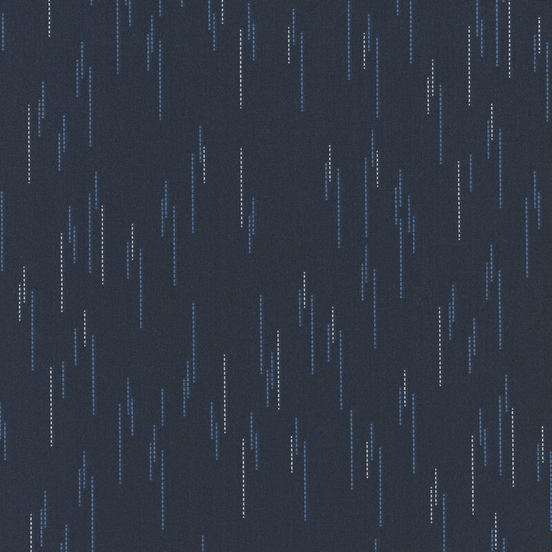 Navy blue fabric with a pattern of spaced apart dotted lines.
