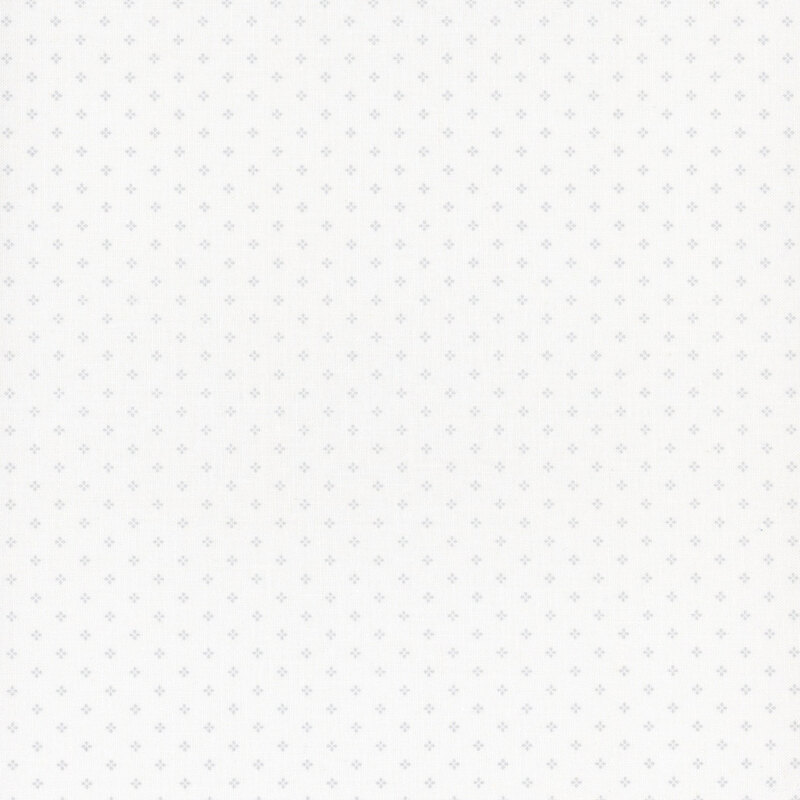 White fabric with a pattern of small, gray, geometric diamond shapes. 