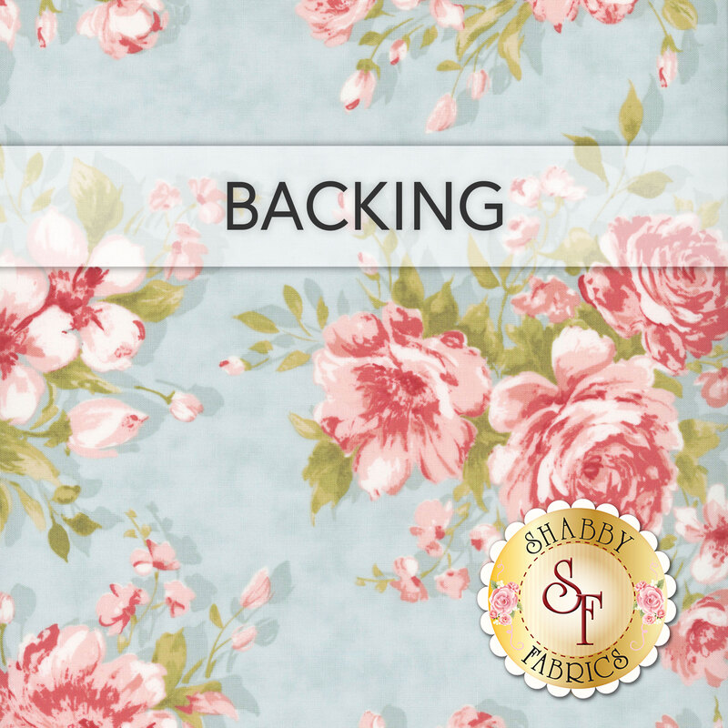 A swatch of vintage blue fabric with large pink florals. A transparent banner at the top reads 