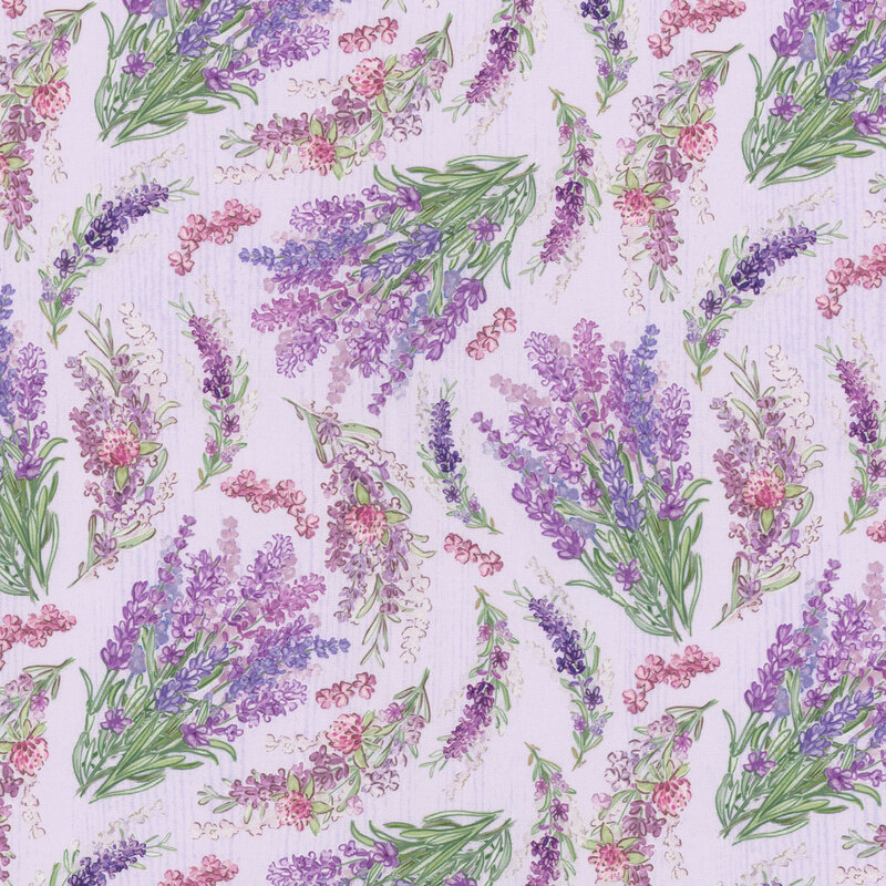Bundles of fresh purple lavender scattered on a textured lilac background.