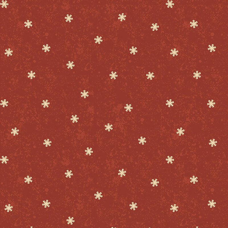 Crimson mottled fabric with scattered cream snowflakes