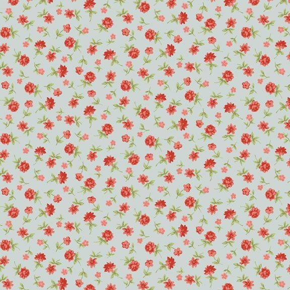 Light turquoise fabric with a calico pattern of coral red roses and pink flowers.