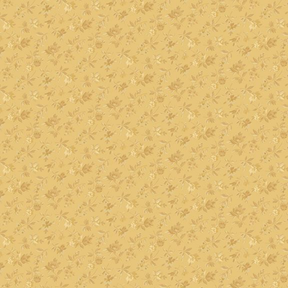 Honey yellow fabric with a dark gold calico floral pattern.