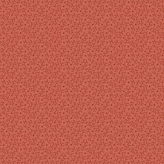 Salmon colored fabric with dark crimson abstract lines.