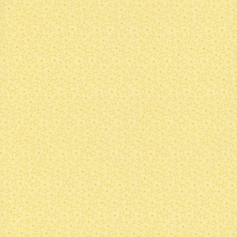 Butter yellow fabric with abstract tonal lines.