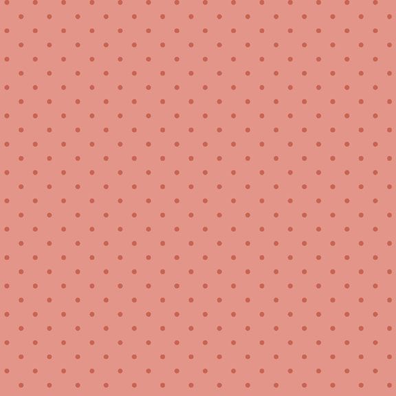 A coral pink fabric with evenly spaced, watermelon red dots.