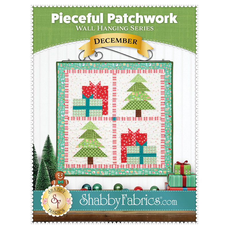 Front cover of the pattern showing the completed project depicting trees and presents in red, blue, green, and white fabrics, staged on a white paneled wall with coordinating Christmas décor.