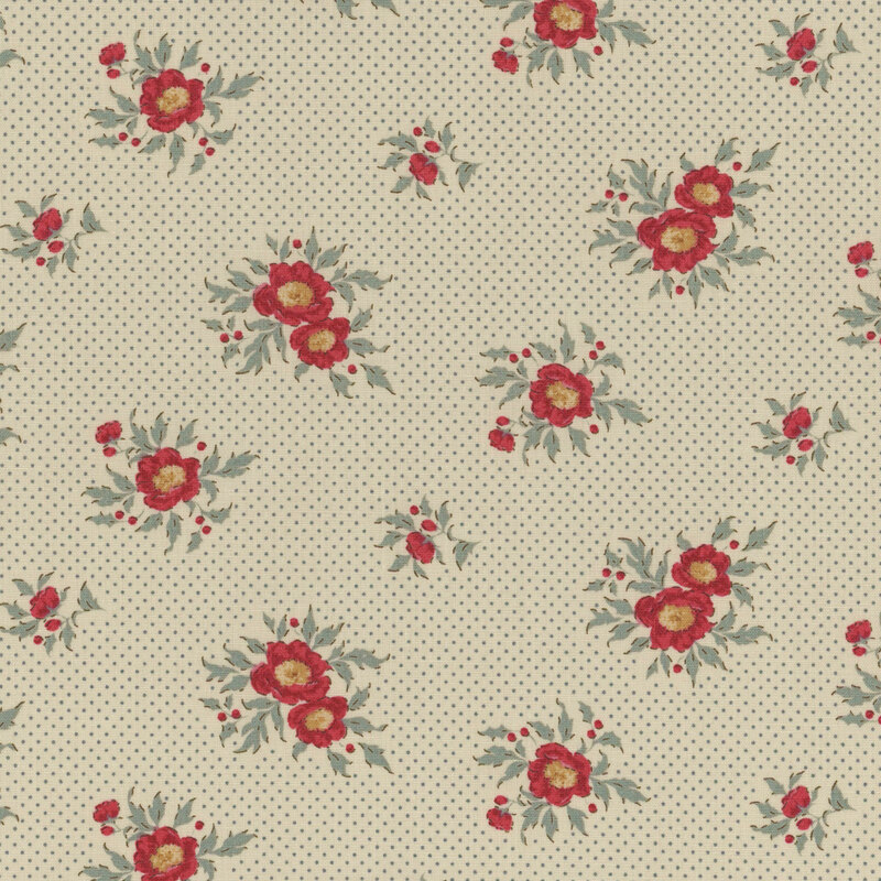 A repeated floral pattern featuring red flowers and blue leaves on a cream fabric.