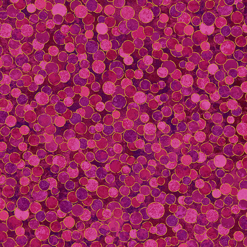 pink and purple mottled fabric featuring gold metallic outlined and overlapping dots
