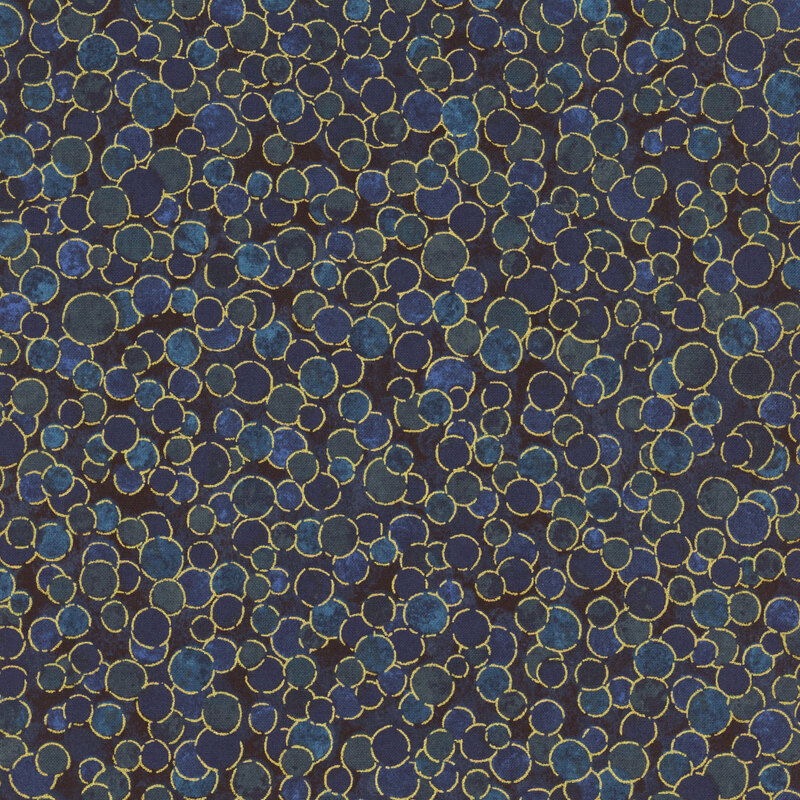 mottled navy fabric with overlapping dots of blues with gold metallic outlines.