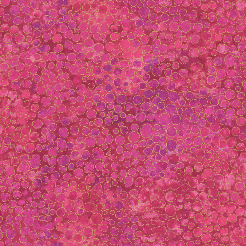 mottled bubblegum pink fabric with an abstract paint-splatter effect and gold metallic accents.