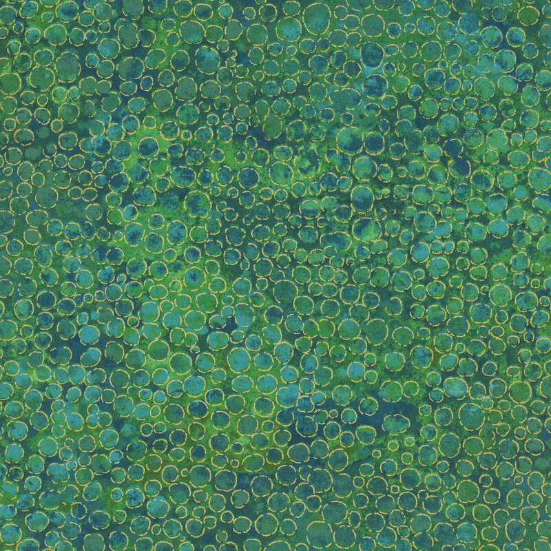 mottled kelly green fabric with an abstract paint-splatter effect and gold metallic accents.