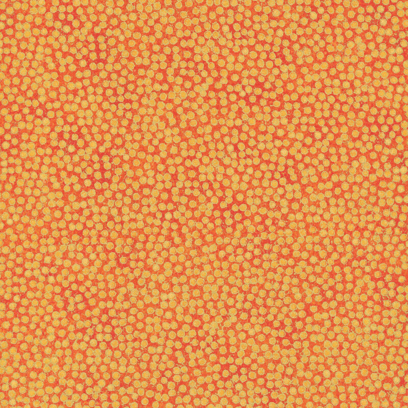 mottled tangerine fabric featuring dense, small dots with gold metallic outlines
