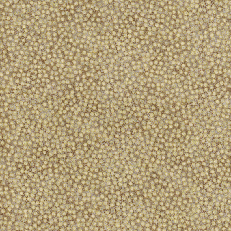 mottled taupe fabric featuring dense, small dots with gold metallic outlines
