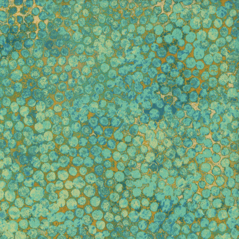 mottled sage green fabric featuring abstract dots with dark green and gold accents.