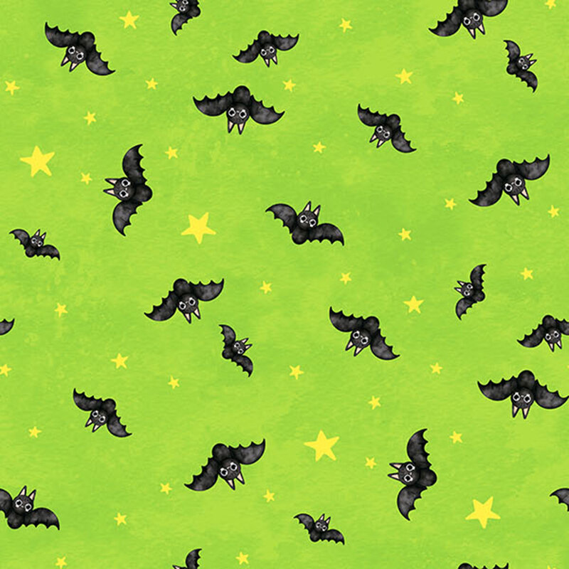 lime green fabric featuring black bats flying amongst yellow stars