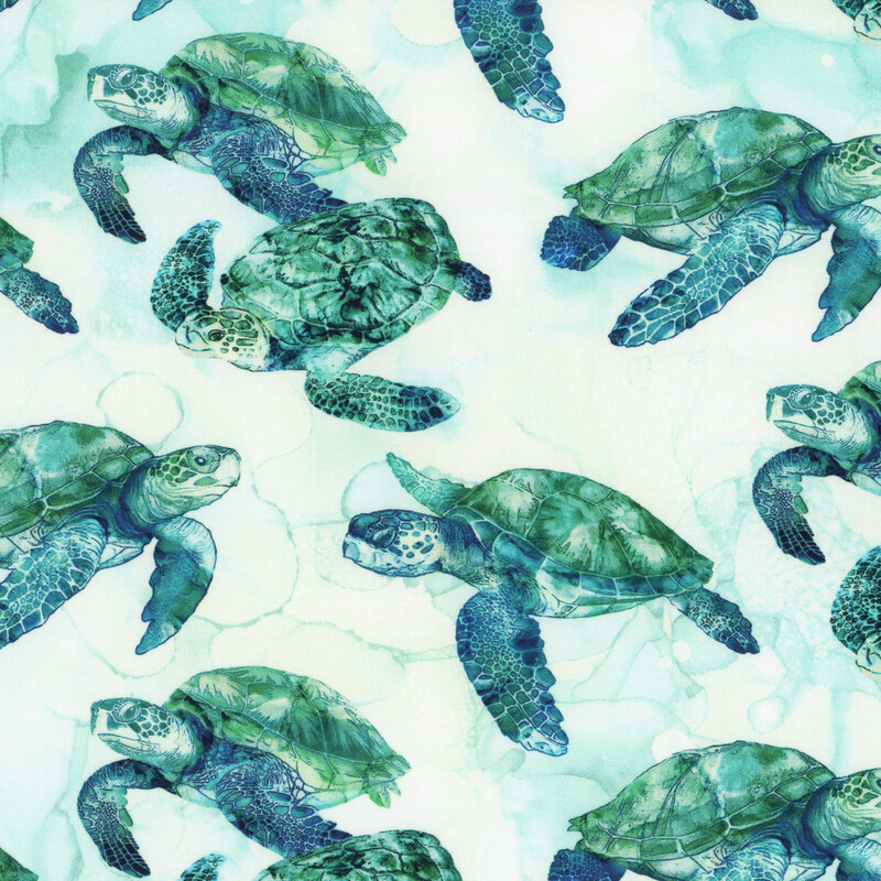 white fabric with teal watercolor features giant dark teal sea turtles.
