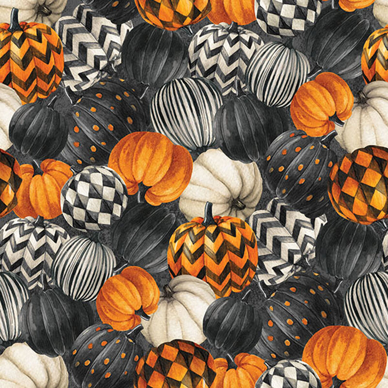 Painted pumpkins in gold, black, and white of dots, zigzags, checkers packed on a mottled black background.