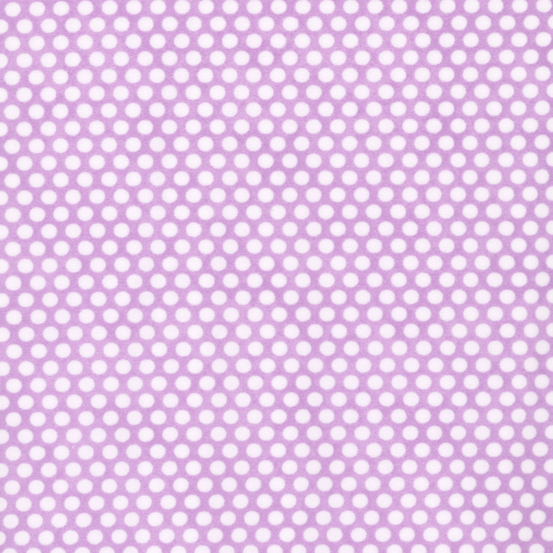 Mottled purple fabric with neat rows of small white polka dots.a