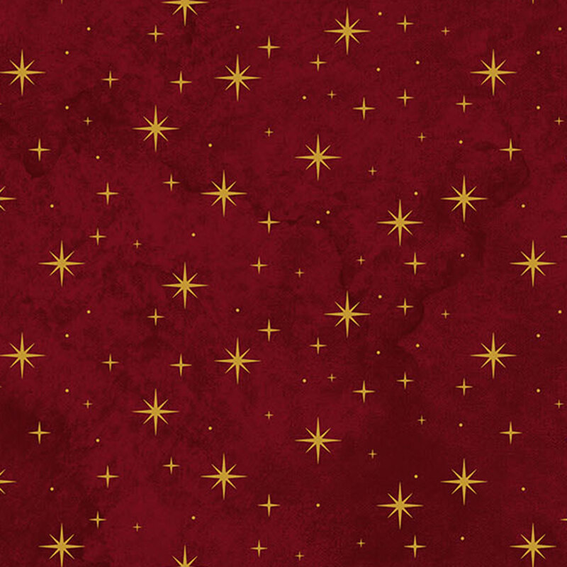 mottled burgundy fabric featuring gold metallic stars