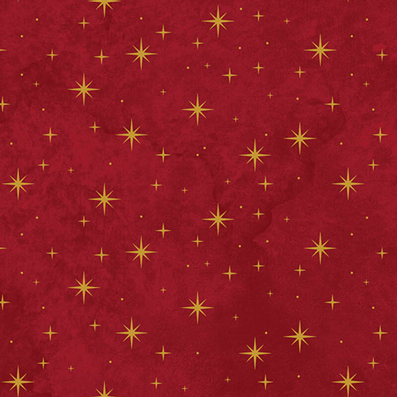 mottled deep red fabric featuring gold metallic stars