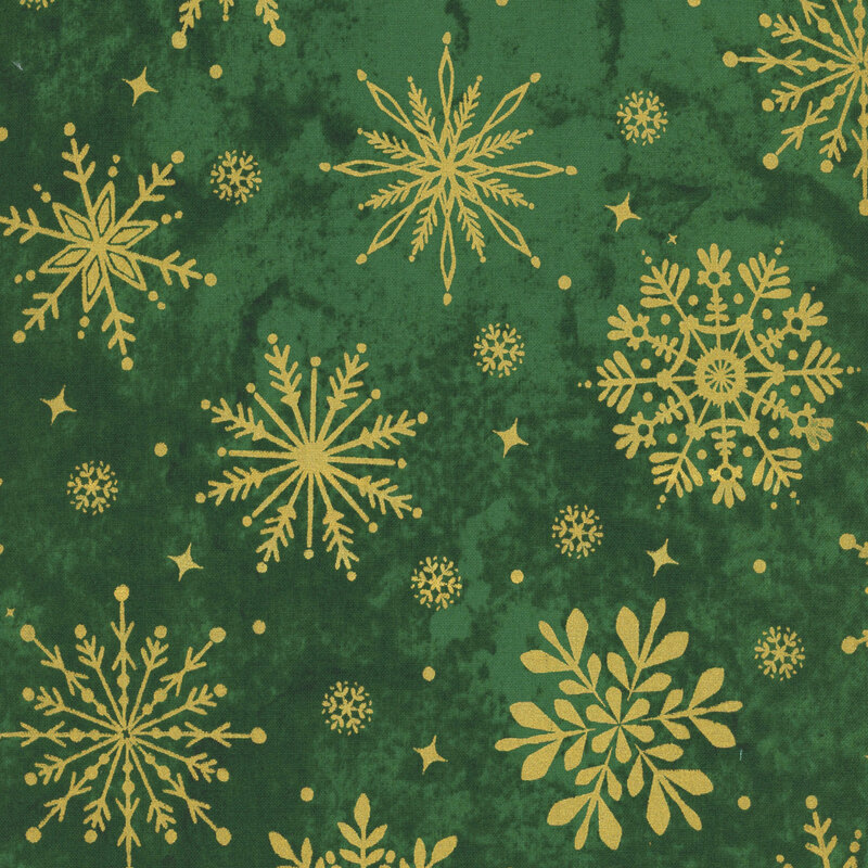 Mottled dark green fabric featuring gold metallic stylized snowflakes, dots, and stars.