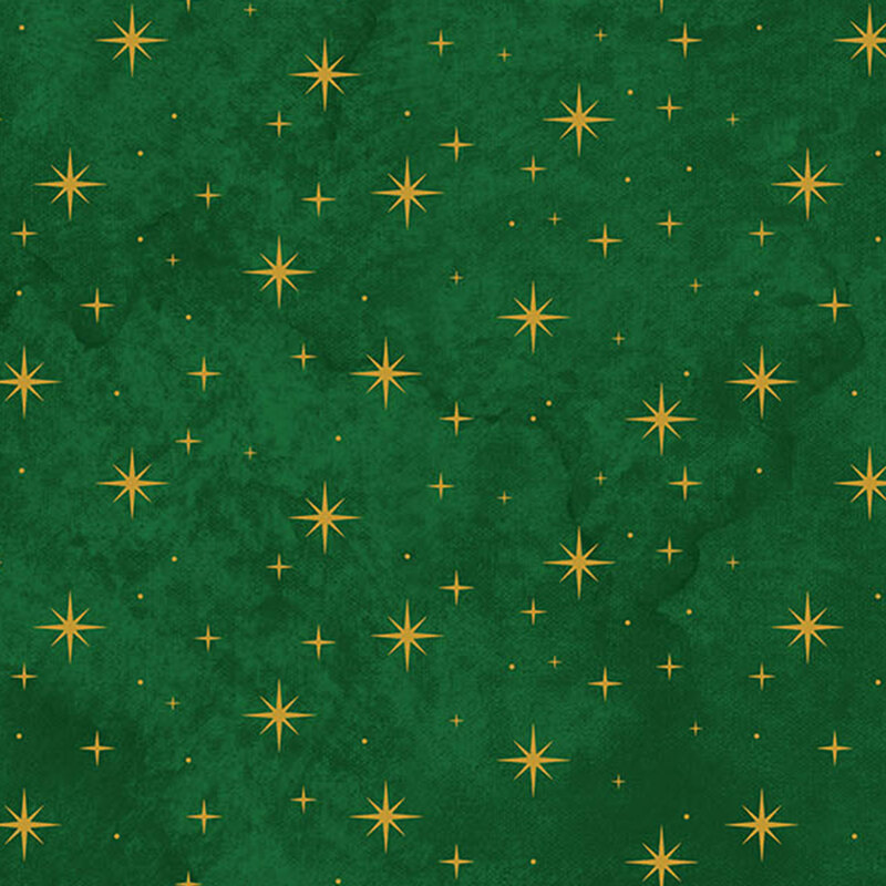 mottled evergreen fabric featuring gold metallic stars