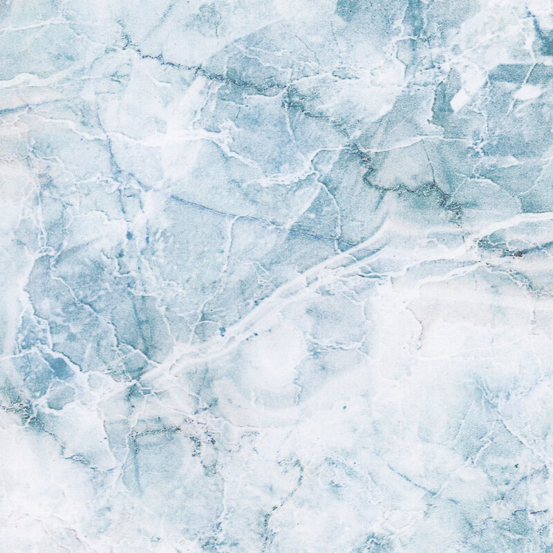 Ice blue marble stone pattern with streaks of beige and aquamarine