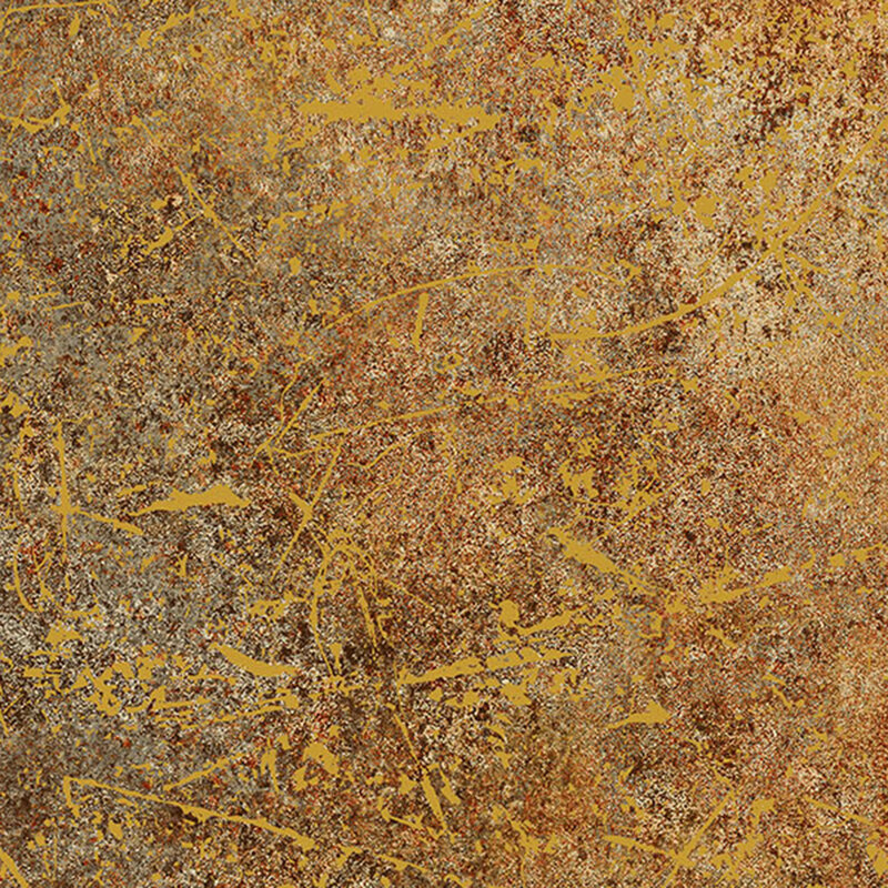 A tan fabric with a dark brown texture and gold metallic splattered accents
