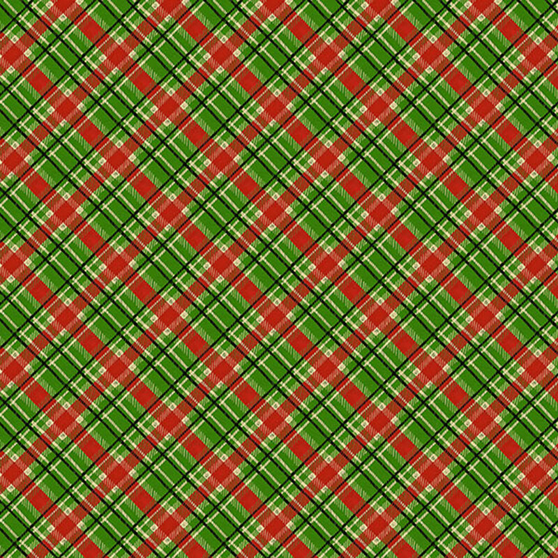 Green fabric with a classic plaid pattern in red, black, and cream.