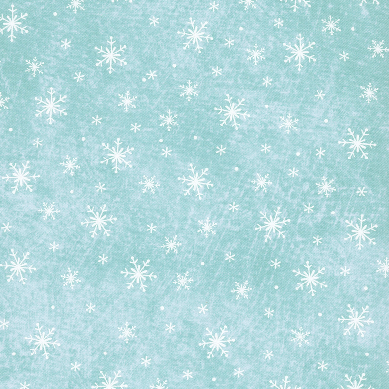 textured icy blue fabric tossed with white snowflakes