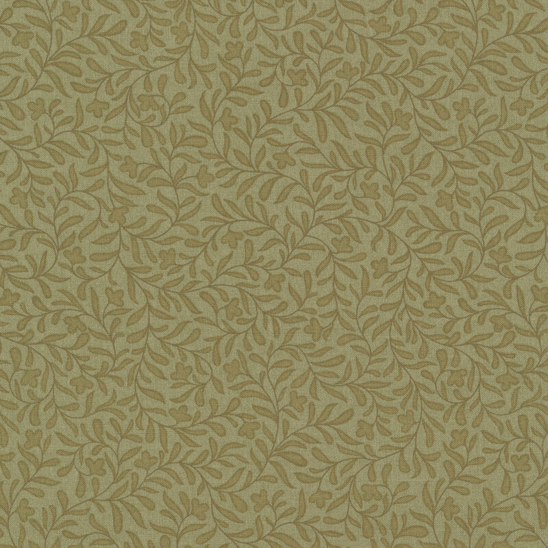An army green fabric with a dense tonal leafy vine design