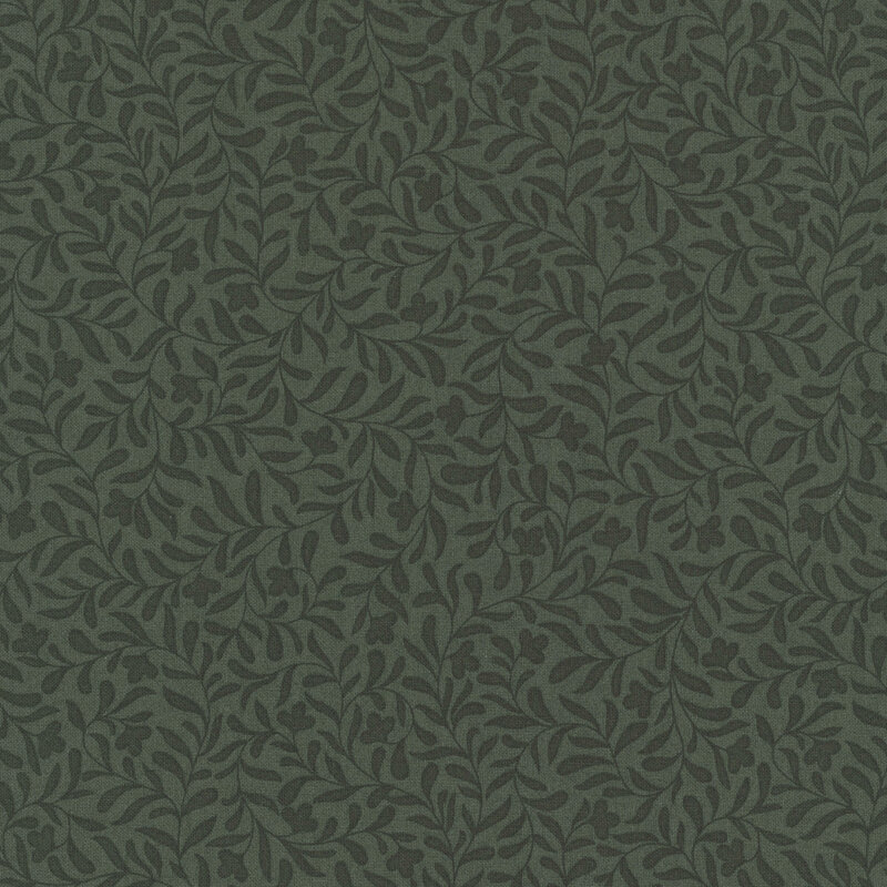 A dark teal green fabric with a dense tonal leafy vine design 