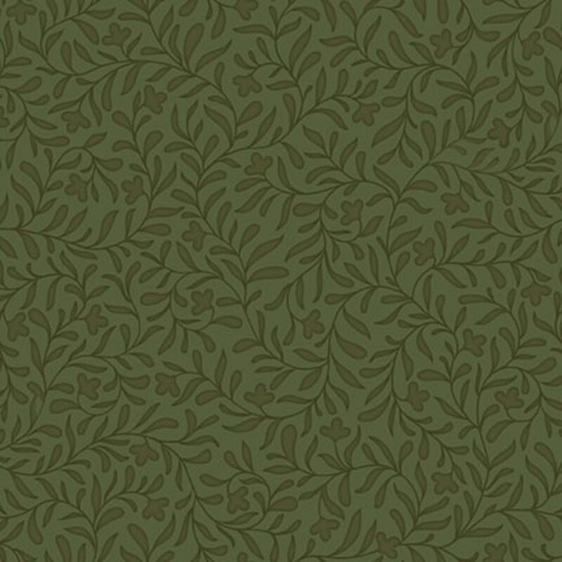 An avocado green fabric with a dense tonal leafy vine design 