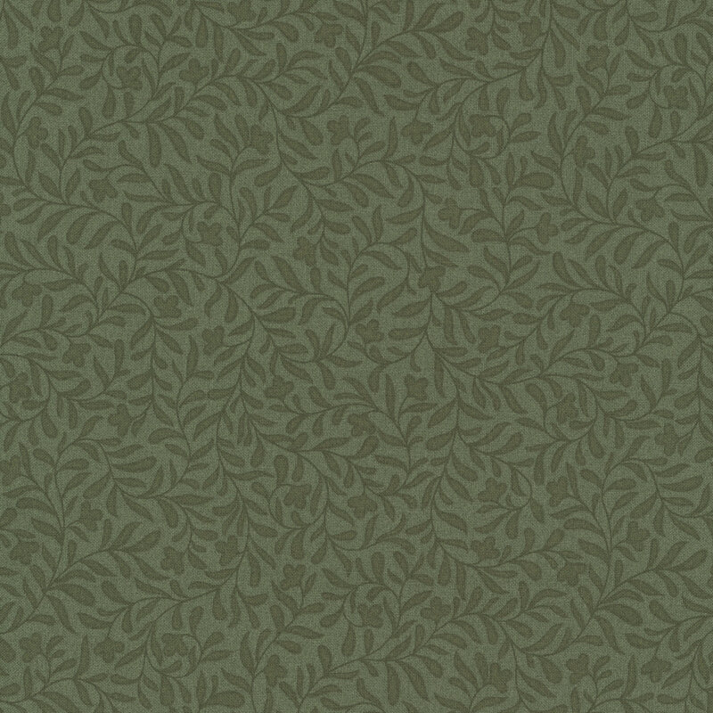 An avocado green fabric with a dense tonal leafy vine design 