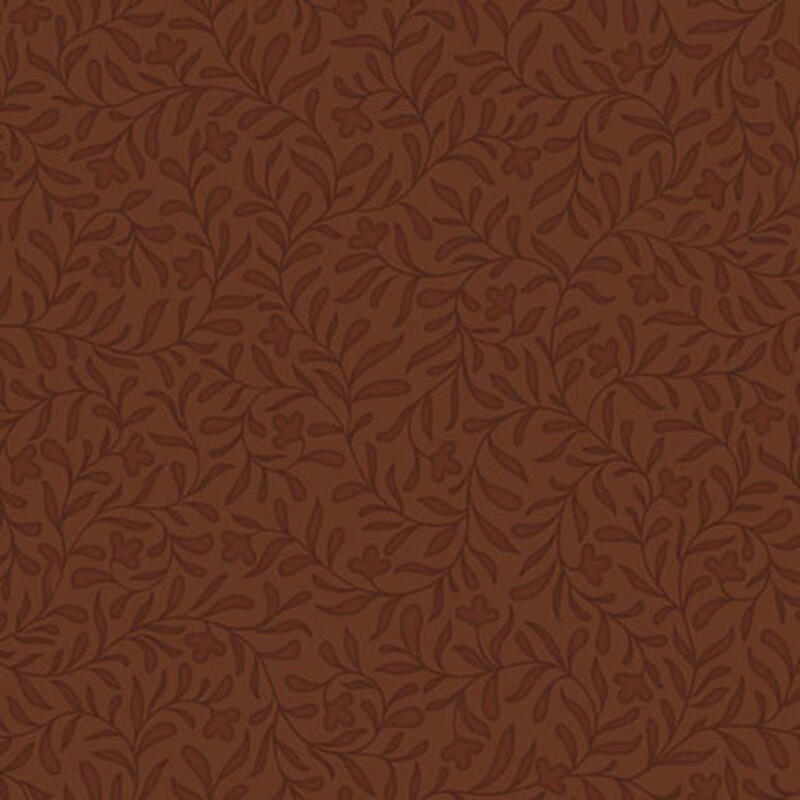 A cinnamon brown fabric with a dense tonal leafy vine design