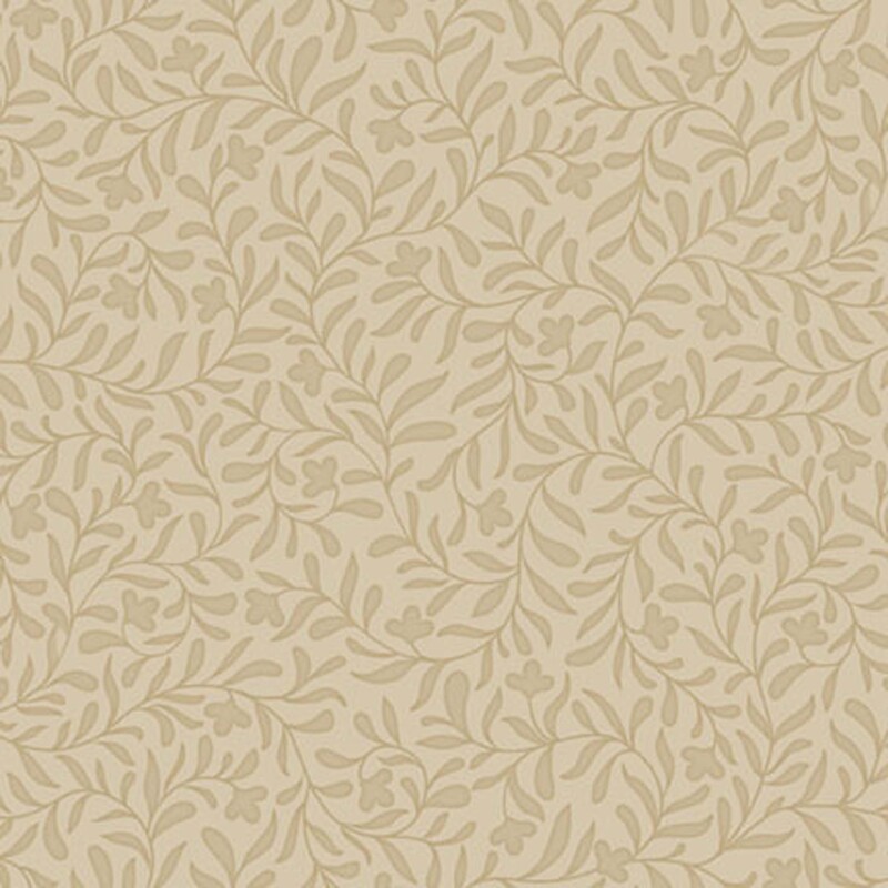 A mushroom tan fabric with tonal tan leafy vine fabric. 