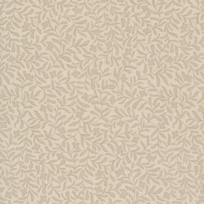 A mushroom tan fabric with tonal tan leafy vine fabric. 