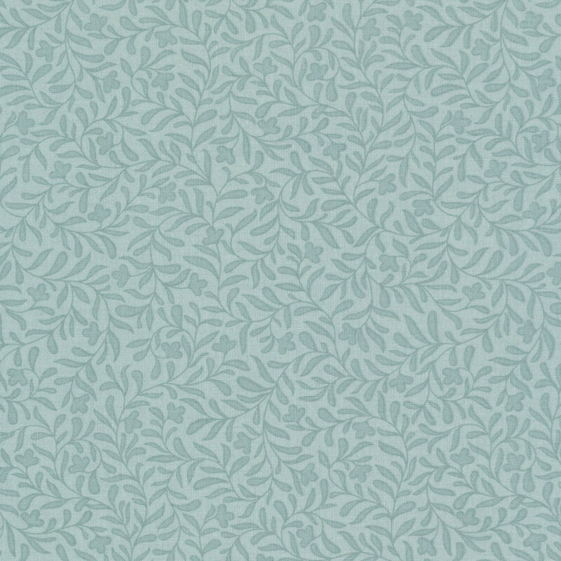 A light teal fabric with a dense tonal leafy vine design 