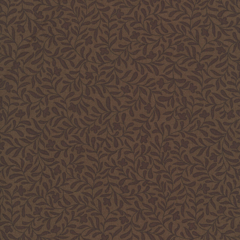 A walnut brown fabric with a dark espresso leafy vine pattern 