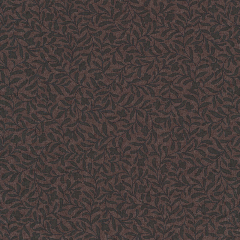 A walnut brown fabric with a very dark espresso leafy vine pattern