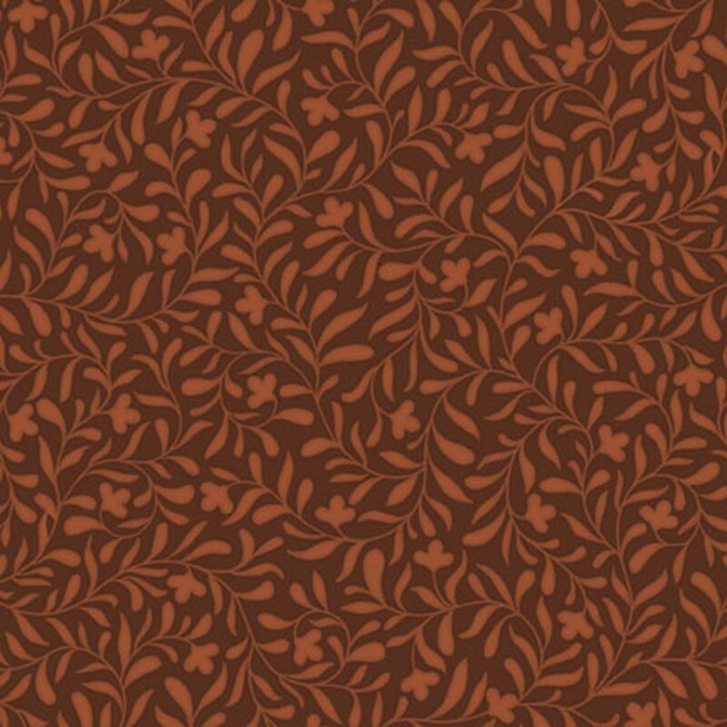 A cinnamon brown fabric with a tangerine orange leafy vine pattern.