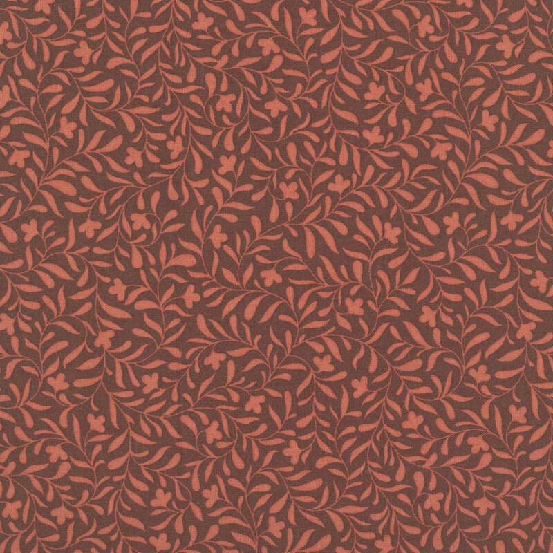 A cinnamon brown fabric with a tangerine orange leafy vine pattern.