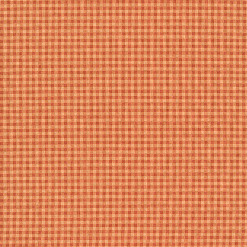 A tangerine fabric with a bright orange gingham print