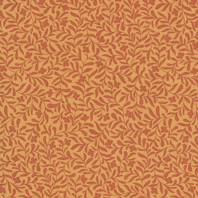 A clementine fabric with a dense red-orange leafy vine design