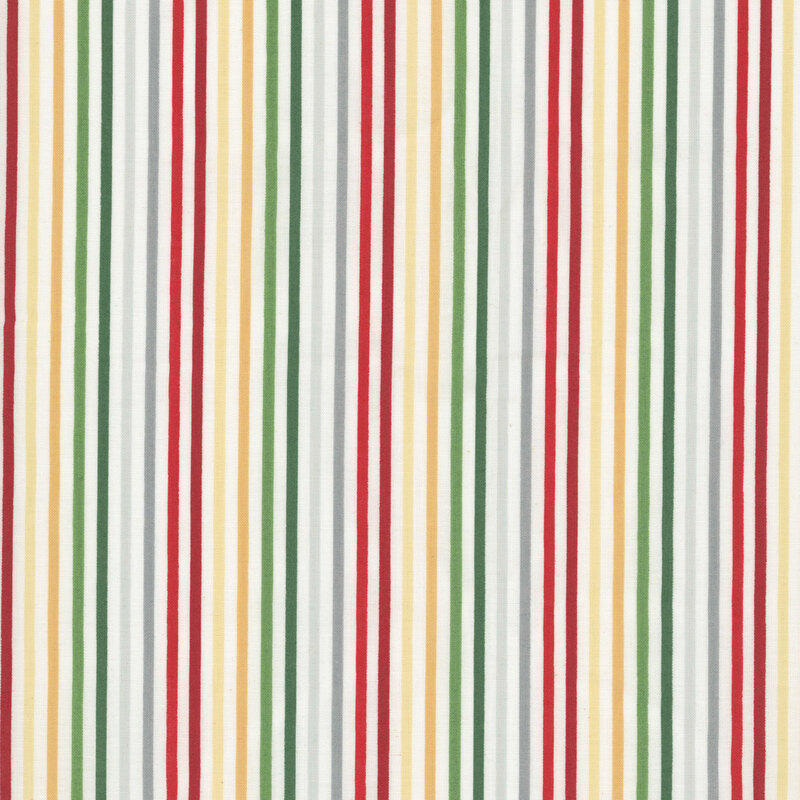 White striped fabric with holiday red, green, gold, and silver.
