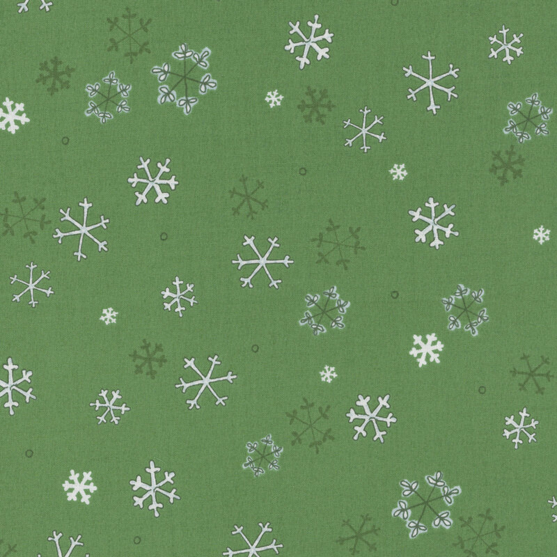 Kelly green fabric with white and dark green illustrated snowflakes