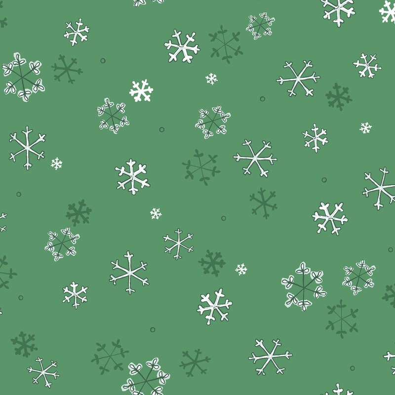 Kelly green fabric with white and dark green illustrated snowflakes