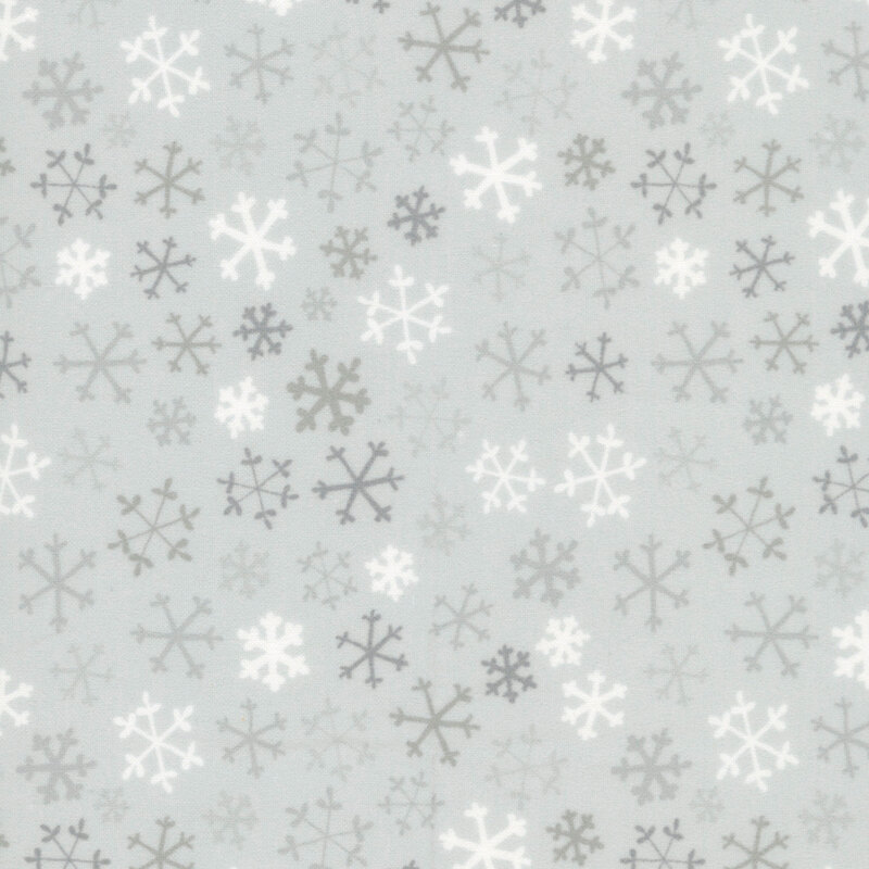Light gray fabric with dark gray and white snowflakes.